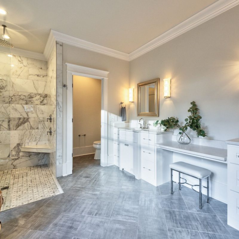 Large-Walk-In-Marble-Shower-And-Herringbone-Floor